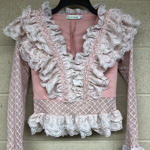 Faveciros Pink Top with Ruffle Neckline, Hem and Cuffs  Ladies Size Large  **